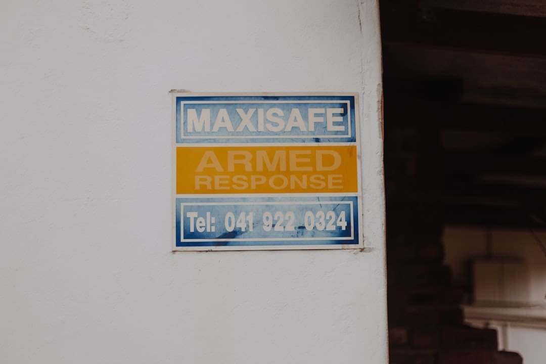 ADA complaint — a blue and yellow sign on a white wall