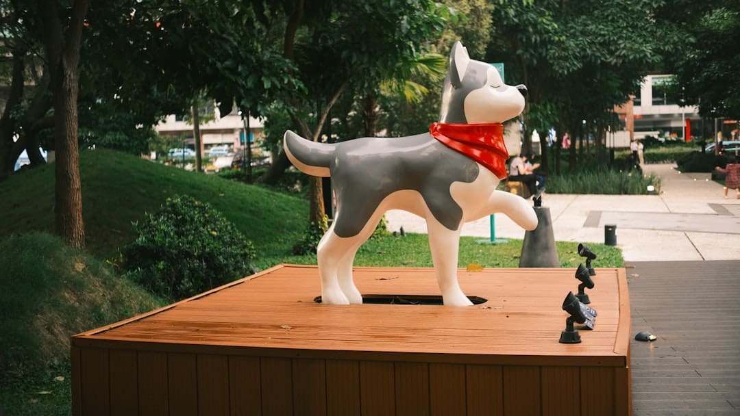 ADA complaint — A statue of a husky wearing a bandana.